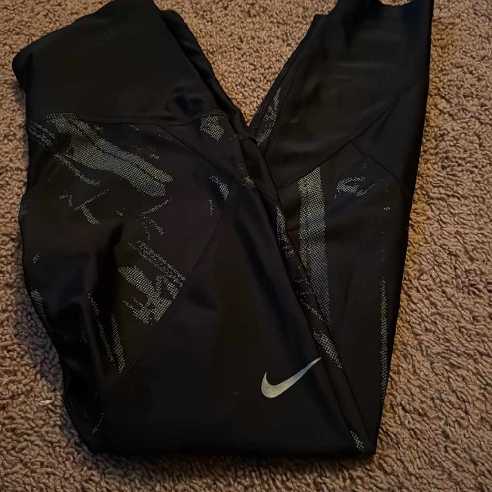 Nike running leggings size small. 25”
Excellent condition
